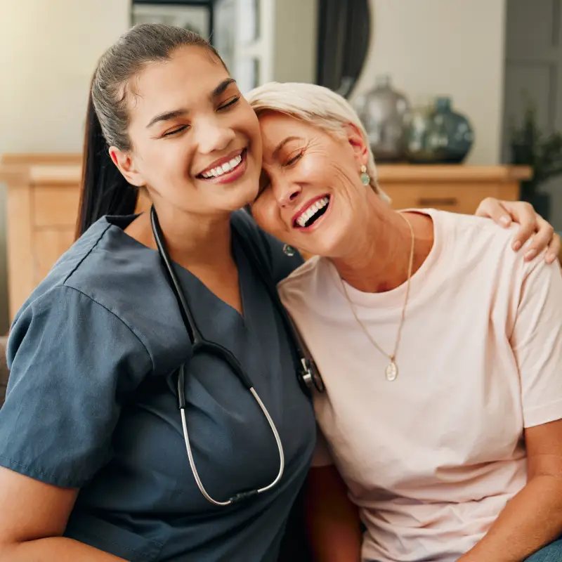 Client laughing with her Alllied Health Support care worker