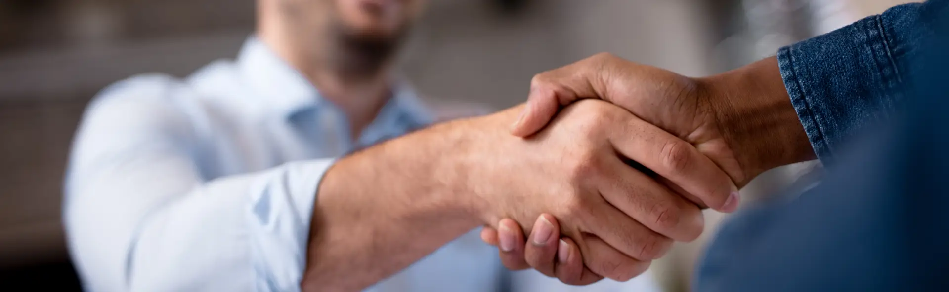 Client Shaking Finance brokers hand