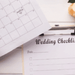 Person planning a wedding using a checklist and calendar beside a laptop and coffee, symbolising how personal loans can help organize and finance wedding expenses