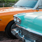 Two restored classic cars representing vehicles eligible for classic car financing