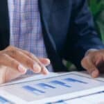 Australian small business owner checking cash flow before applying for an unsecured business loan