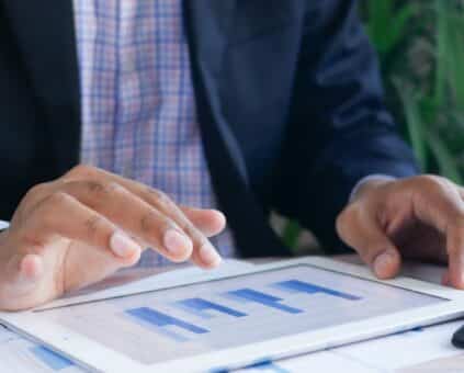 Australian small business owner checking cash flow before applying for an unsecured business loan