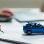 Person comparing car loan options