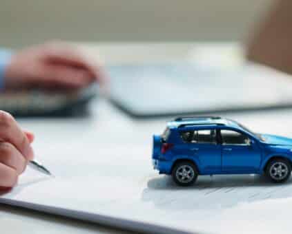 Person comparing car loan options