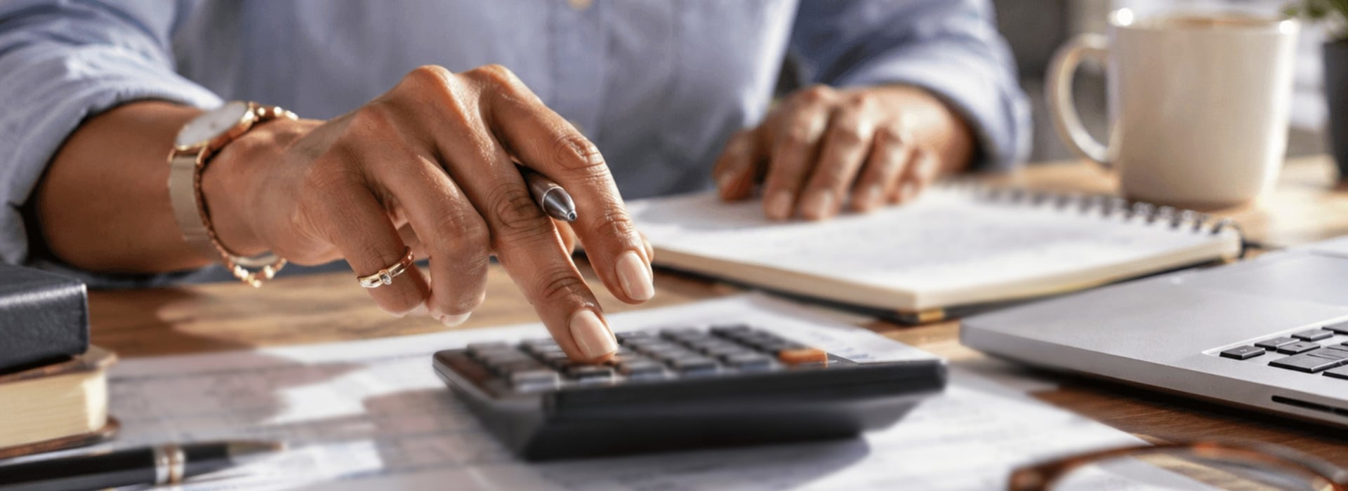 Business owner looking over bills